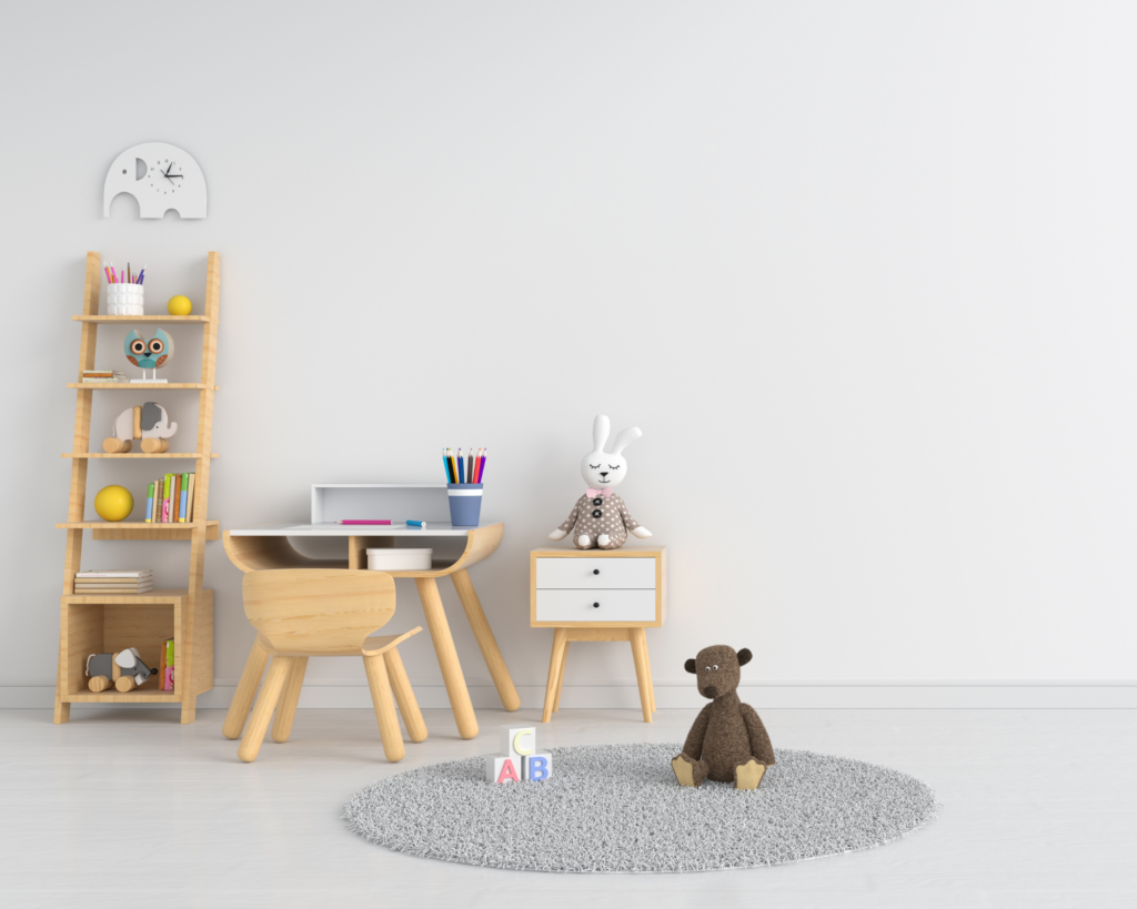 Neutral colored learning space for young child. Includes shelf, desk, chair, and drawers.