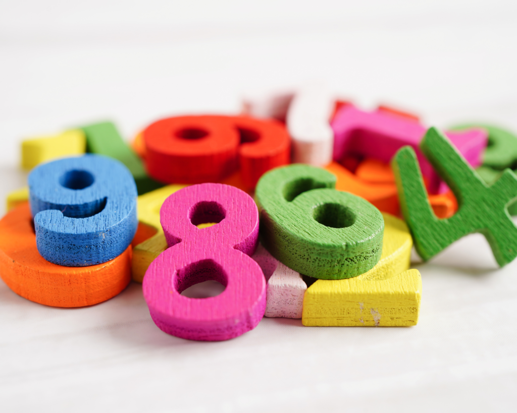 Wooden numbers used for preschool number recognition.