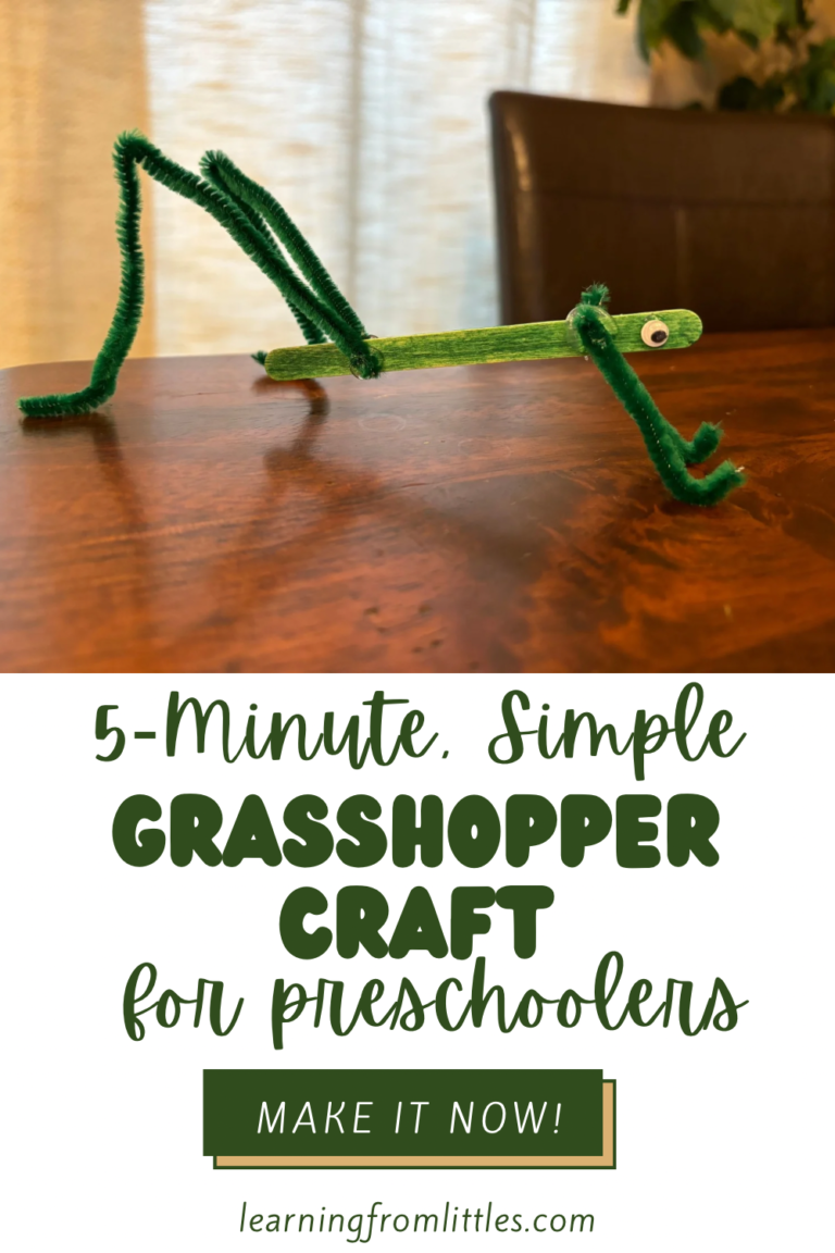 Green grasshopper craft made with popsicle stick and pipe cleaners.