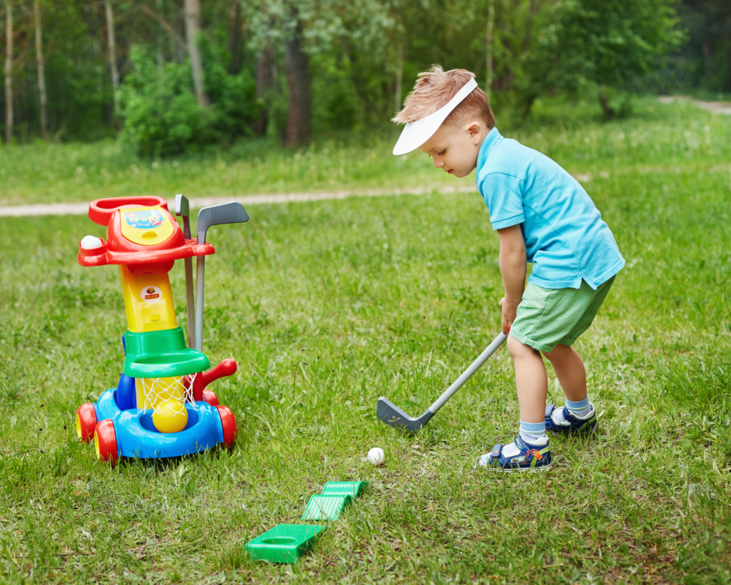 Boy playing golf